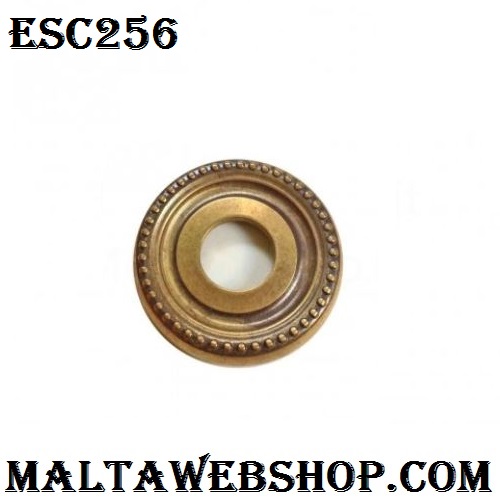 Embossed round backplate in brass in Malta