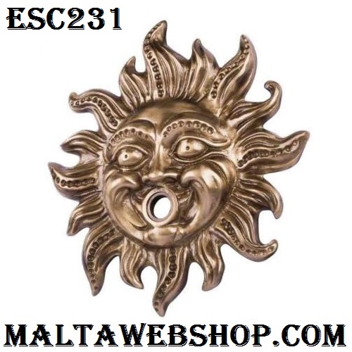 Wall hanging sun face in brass for tap in Malta